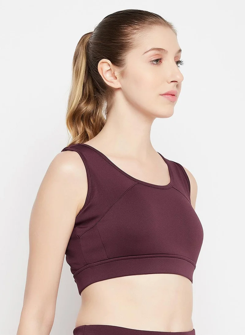 Clovia Red Medium Impact Padded Racerback Sports Bra in Maroon for Women | Best Price UAE